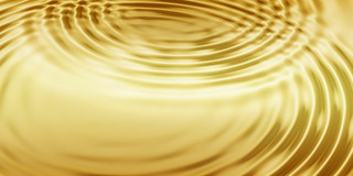 little waves on golden water